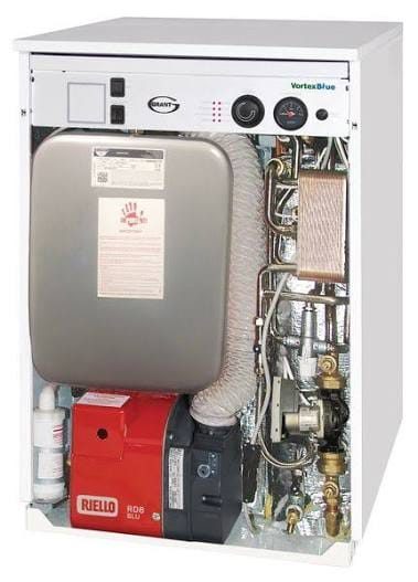 Oil boiler with the case removed, showing the burner and heat exchanger